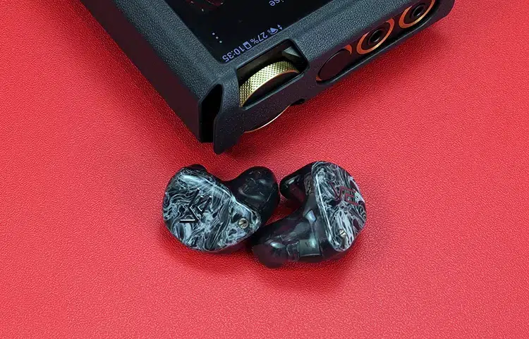 Vision Ears VE ONE shells beside FiiO M27 DAP