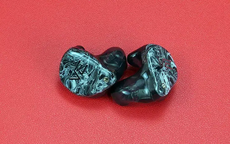 Vision Ears VE ONE shells on red background