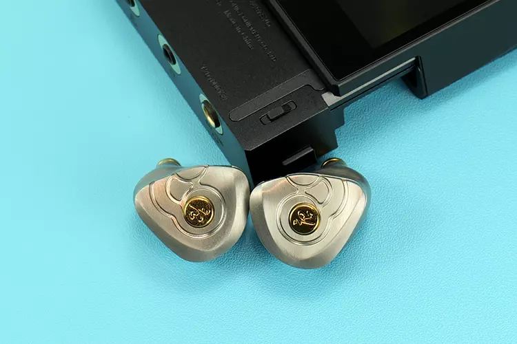 Cayin T201 beside Tangzu Monkey King IEMs