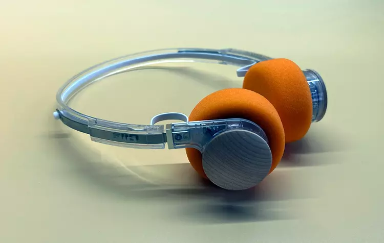 FiiO EH11 headphones on a yellow background