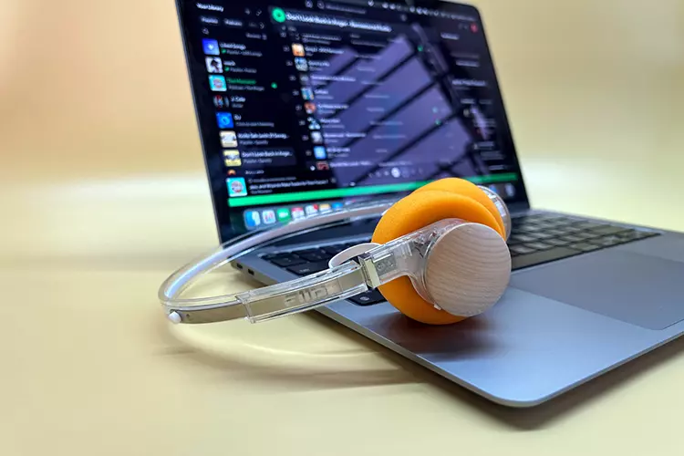 FiiO EH11 headphones on top of a MacBook keyboard
