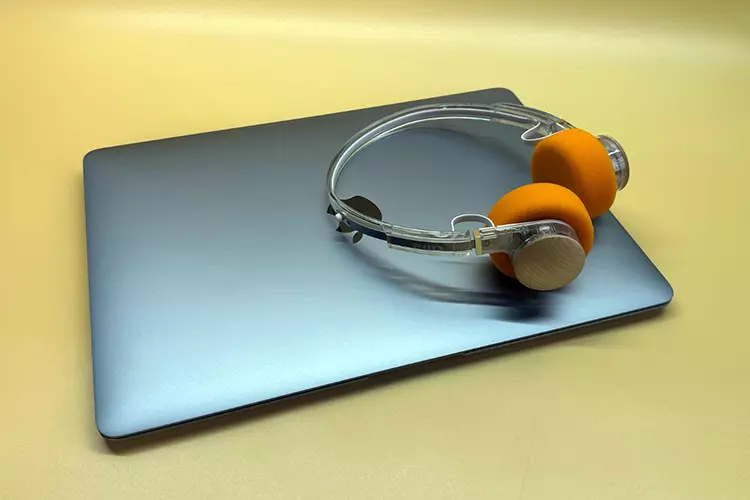 FiiO EH11 headphones on top of closed MacBook