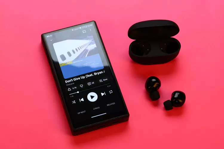 FiiO M33 R2R beside Sony Wireless earbuds