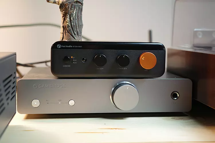 Fosi Audio BT20A MAX on top of a cambridge audio amplifier