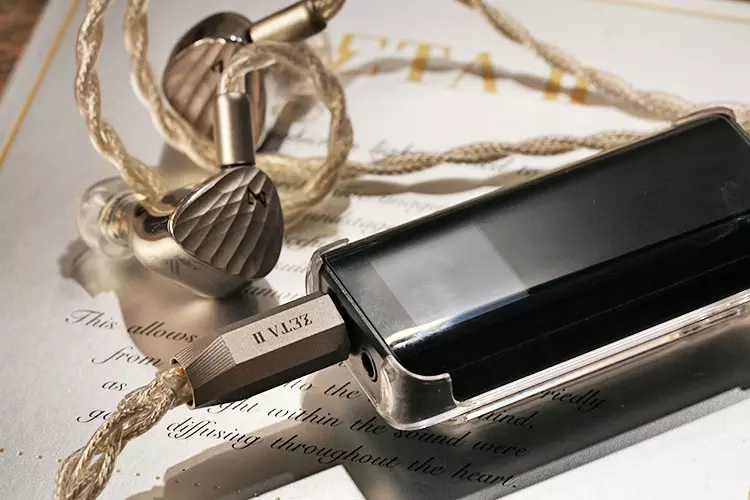 HiBy Zeta II beside the FiiO BTR15 dongle