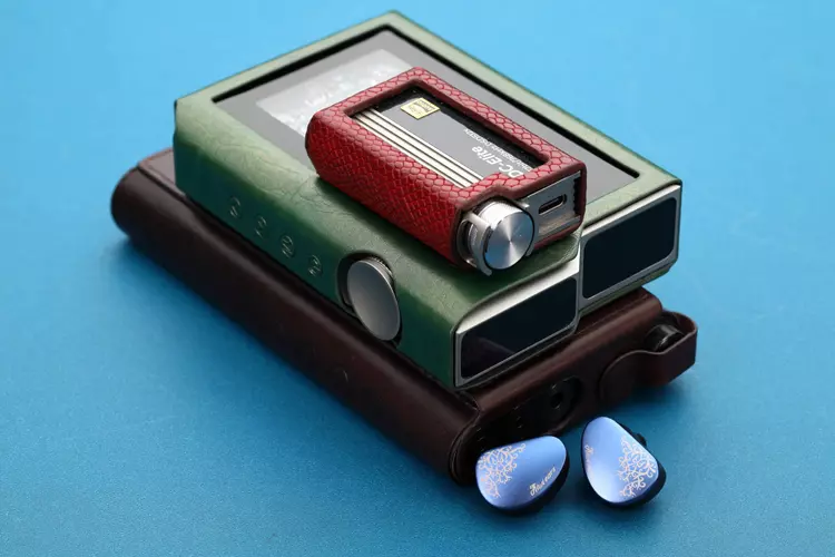 Kiwi Ears Cadenza II beside 3 portable amplifiers