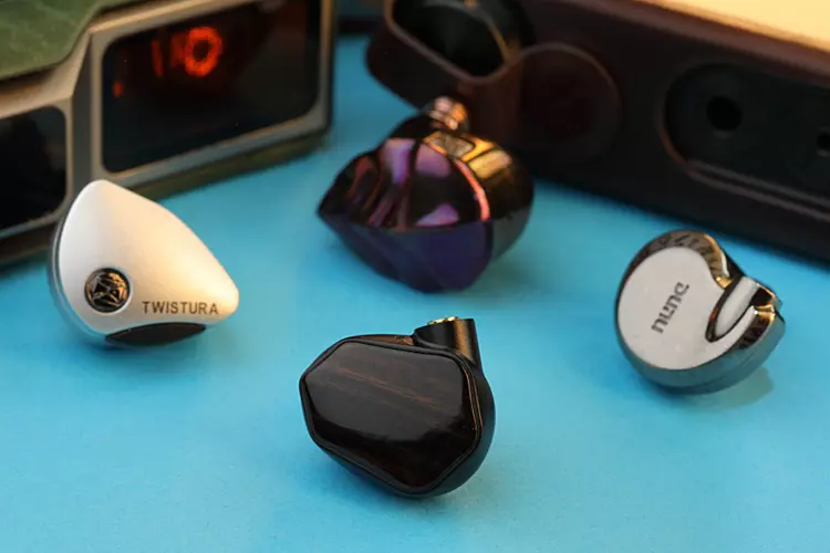 TinHiFi T7 beside 3 other IEMs