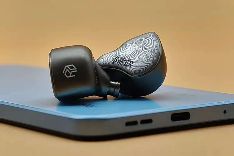 Yanyin Baker on top of blue smartphone