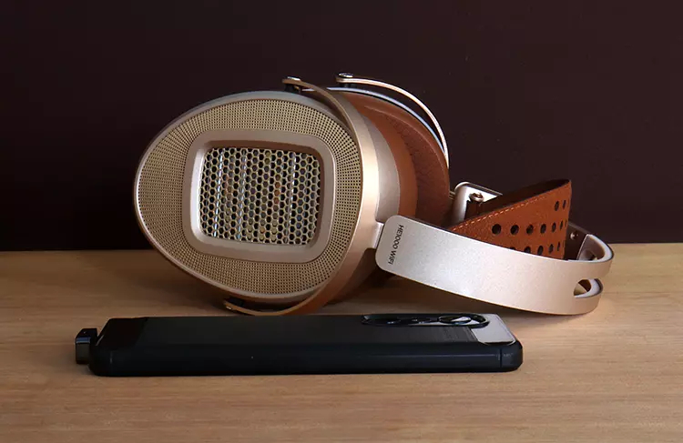 HIFIMAN HE1000 WiFi headphones beside a smartphone