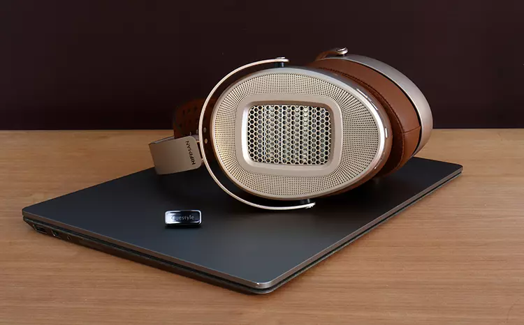HIFIMAN HE1000 WiFi headphones on top of a laptop