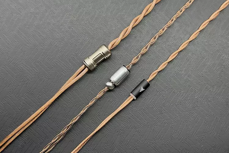 PLUSSOUND Copper Fusion Hybrid cable beside 2 other cables