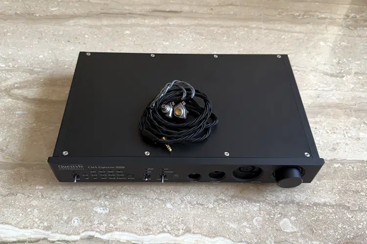Questyle CMA18 Master with IEMs on top