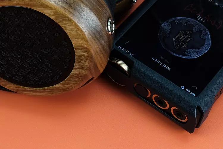 ZMF Headphones Tessidera headphones beside the FiiO M27 DAP