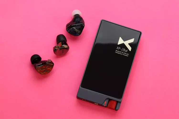 xDuoo XP-2 Bal beside 3 IEMs