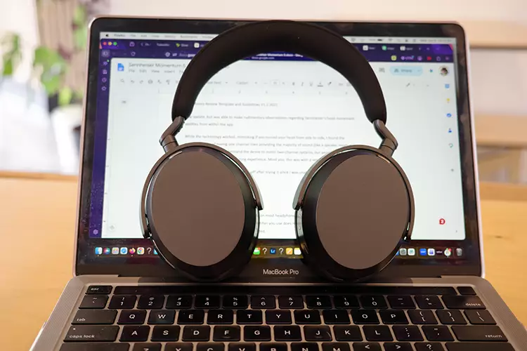 Sennheiser MOMENTUM 5 Wireless in front of MacBook screen