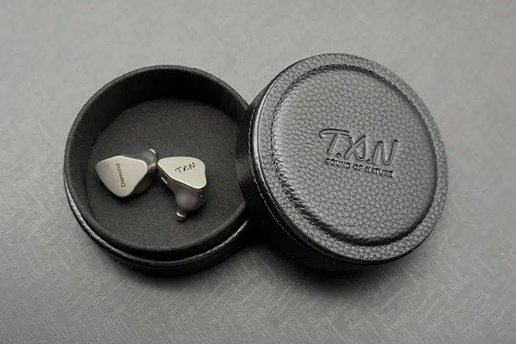 TXN Diamond shells inside their case