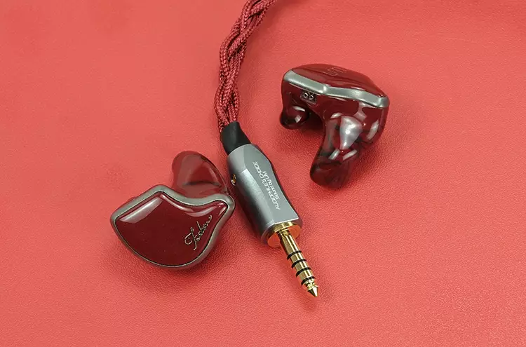 Unique Melody MEST Fortune stock cable sitting between the shells