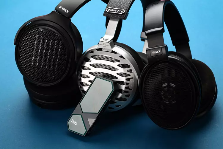 xDuoo Link3 beside 3 headphones