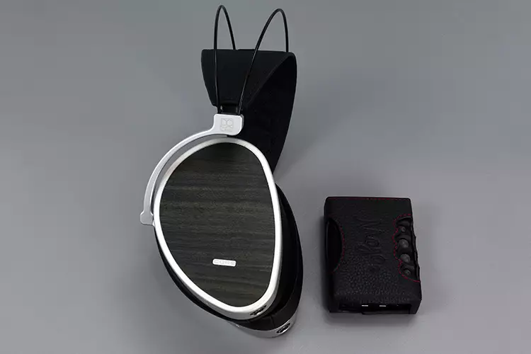Dan Clark Audio AEON CORE headphones beside Chord Mojo 2