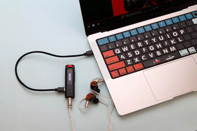 FiiO SNOWSKY ECHO NANO connected to a laptop and IEMs