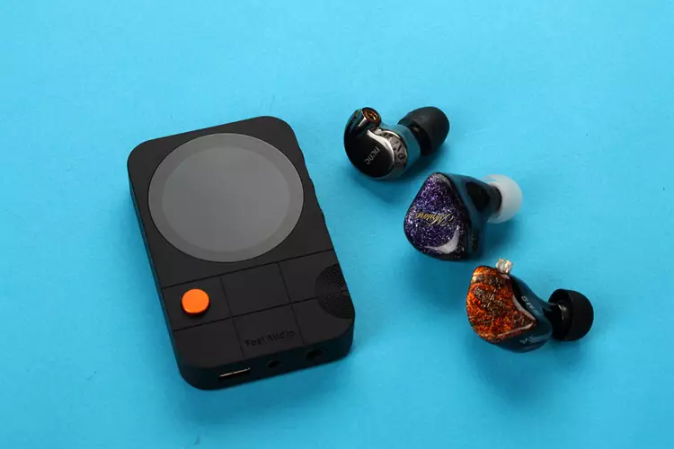 Fosi Audio MD3 beside 3 IEMs