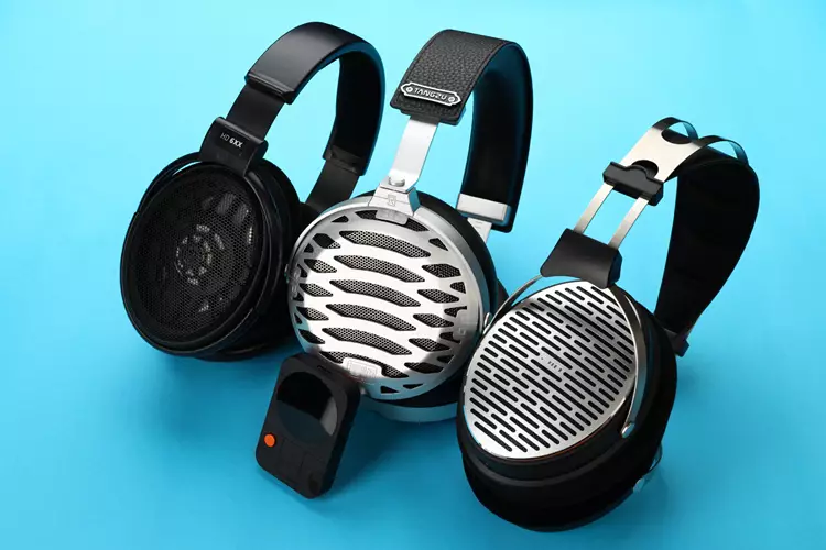 Fosi Audio MD3 beside 3 headphones
