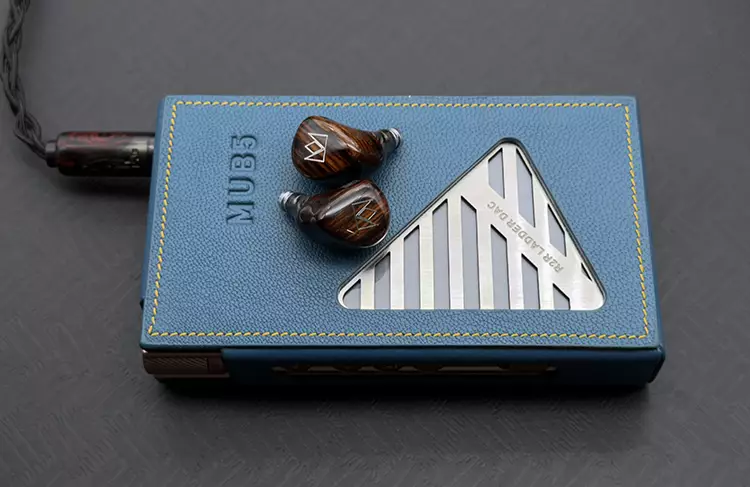 Noble Audio Lu Ban ear shells on top of a portable amplifier